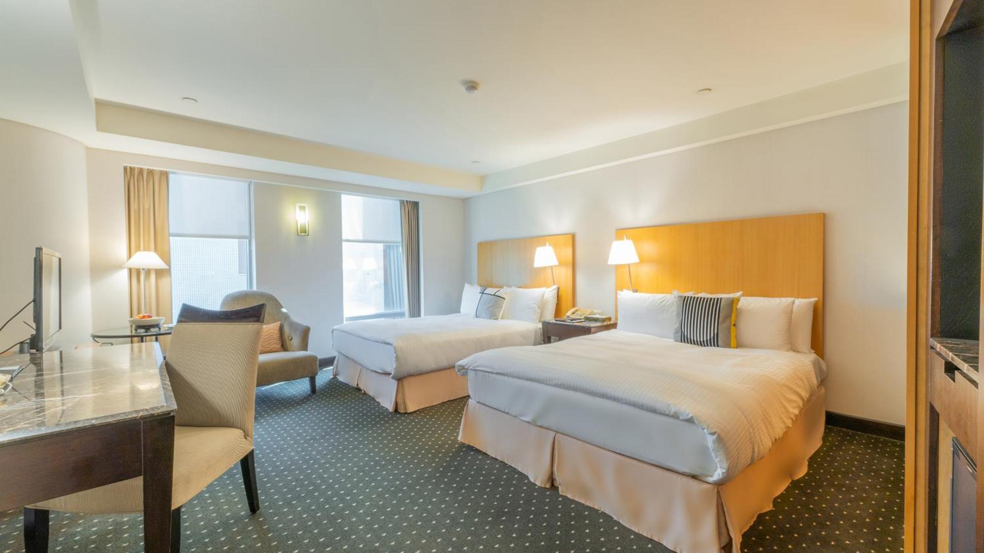 Tempus Hotel Taichung Exterior photo A room at the Hotel Commonwealth